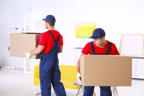 Customer moving items safely through a self storage corridor