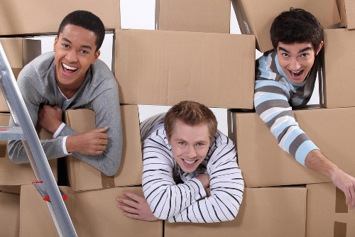 Carefully labeled boxes and furniture stored in a Chelsea storage unit