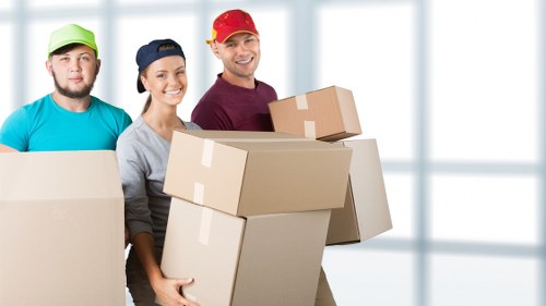 Organised storage unit with goods stacked safely and access kept clear