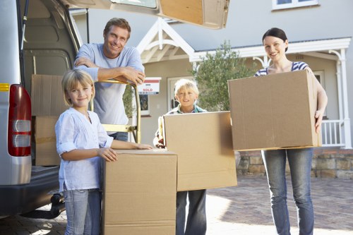 Packed moving boxes and labelled items ready for a Chelsea move