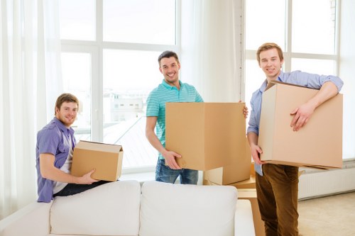 Removal team planning a move in a Chelsea residential street