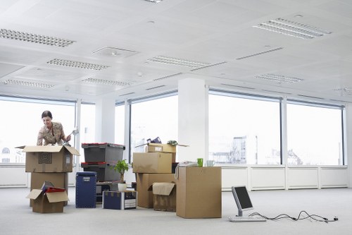 Organised secure storage space in Chelsea with stacked boxes and furniture